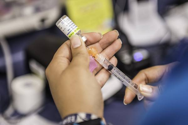 Strong evidence HPV vaccine is saving lives, Simon Harris says