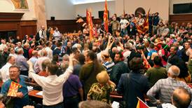 Politicians injured in fist fight as Macedonia parliament stormed