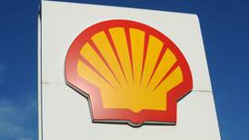Shell profits slump after weak oil forces write-offs