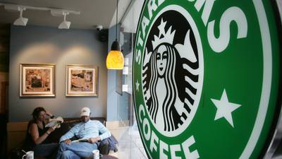 Starbucks says US tax cuts will boost bottom line