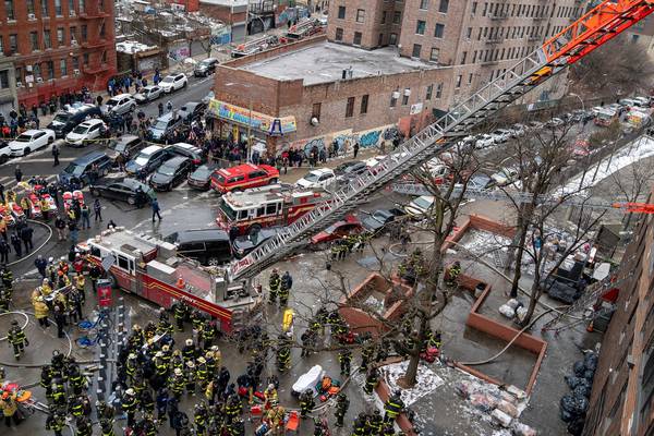 New York City apartment building fire kills 19