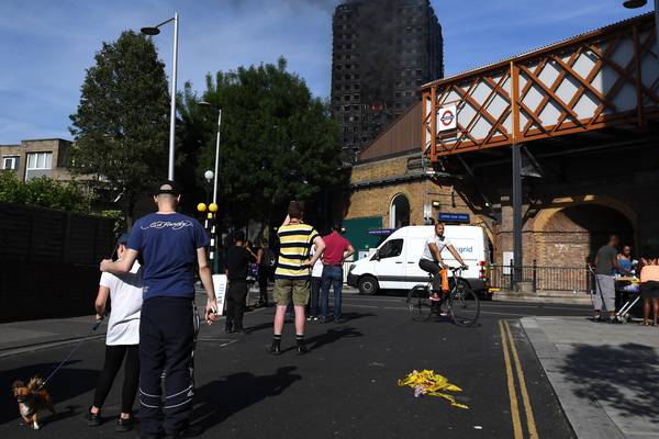 London fire: Woman tried to save baby by dropping it ‘from ninth floor’