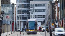 Man (18) taken to hospital after being hit by Luas