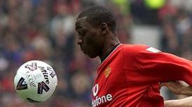 Irishman charged with  racially abusing Andy Cole