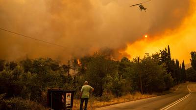 Villagers evacuated as forest fire spreads near Athens