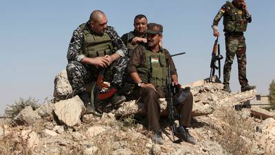 Iraqi and Kurdish forces clash as Baghdad advance continues