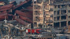Chinese rescuers pull firefighter (19) from explosion rubble