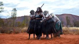 Ancient cave paintings evoke spiritual world at the foot of Uluru