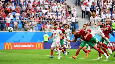 Bouhaddouz heads for infamy to give Iran stunning late win