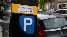 Out-of-town retailers should be obliged to charge for car parking - Senator