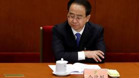 China jails ex-president’s top aide for life on corruption charges