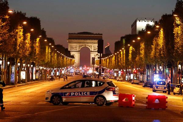 One police officer killed, two wounded in  Paris shooting