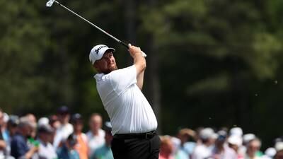 Shane Lowry makes solid start as Tiger Woods struggles at his 25th Masters
