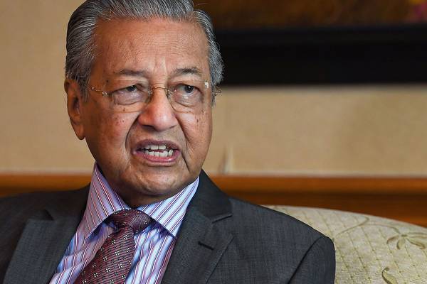 Malaysia thrown into turmoil as PM Mahathir Mohamad resigns