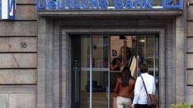 Deutsche Bank warns of deeper cuts after revenue drop