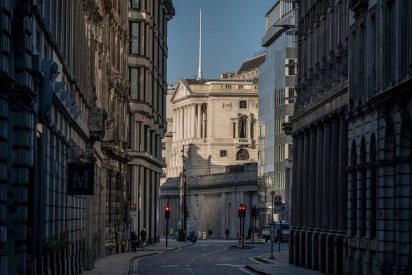 Bank of England keeps rates at record low, ready to provide more support