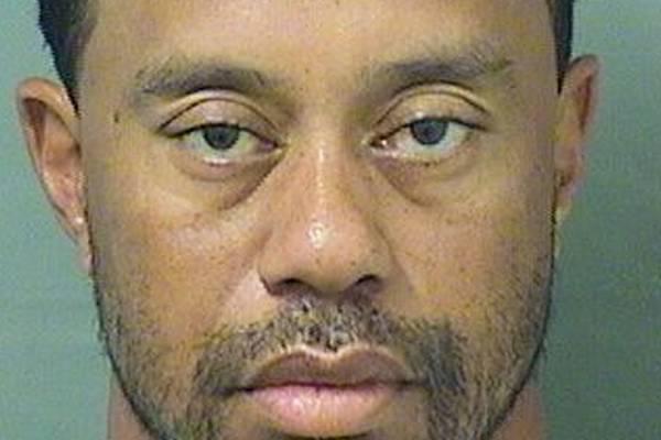 Police found Tiger Woods ‘asleep at the wheel’ with two flat tyres