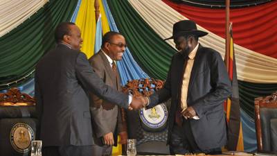 South Sudan president signs peace deal despite concerns