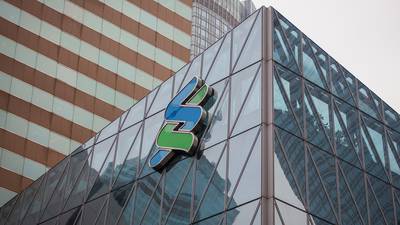 Standard Chartered to sell off assets in Asia