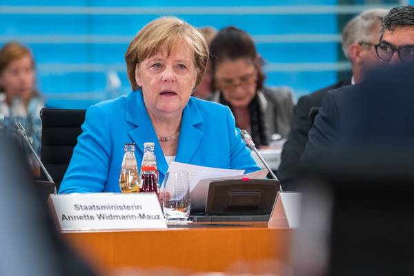 Merkel dealt humiliating blow by own party in refugee policy row