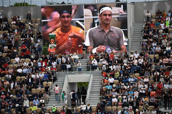 Old favourite Federer gets warm welcome on winning return to French Open