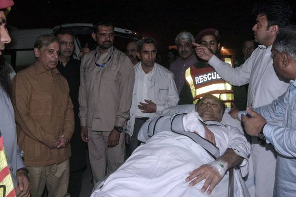 Pakistan minister shot in suspected assassination attempt