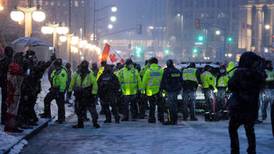 Canadian police arrest protesters and tow trucks in bid to end Ottawa blockade