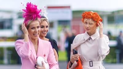 ‘Three to one that hat goes’: Galway Races fashion succumbs to the weather
