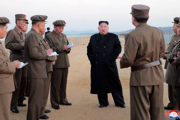 Kim inspects new weapon as North Korea releases US prisoner