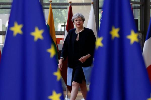 May moves to placate EU with deal on citizens’ rights