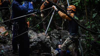 Thai cave search for missing soccer team gathers pace
