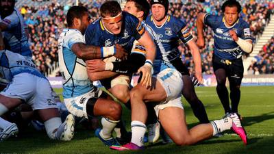Leinster’s double dream stays alive after tense victory