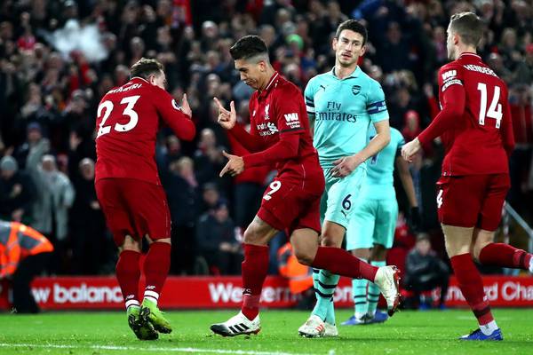 Liverpool storm past Arsenal to go nine points clear at the top