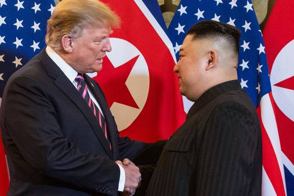 Trump and Kim shake hands to kick off second summit