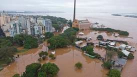 Rising death toll from rains in Brazil as floods destroy roads and bridges