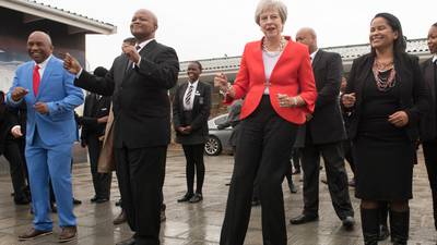 Dancefloor diplomacy: Theresa May dances with school kids in Cape Town