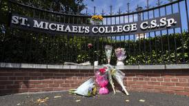 Flowers left at St Michael’s College as school contemplates double tragedy