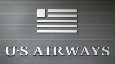 US Airways apologises for pornographic  tweet
