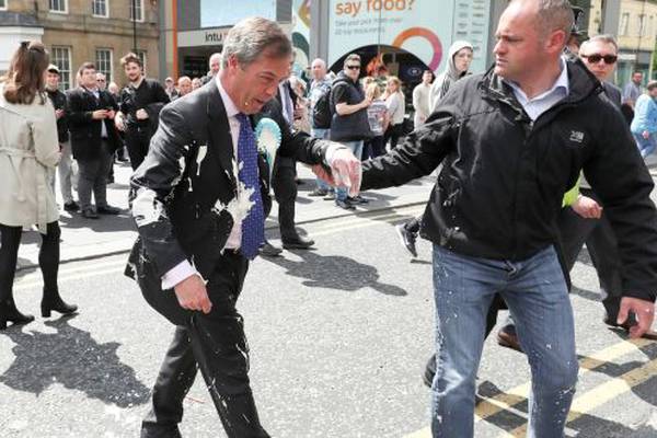 Man charged with assault after hitting Nigel Farage with milkshake
