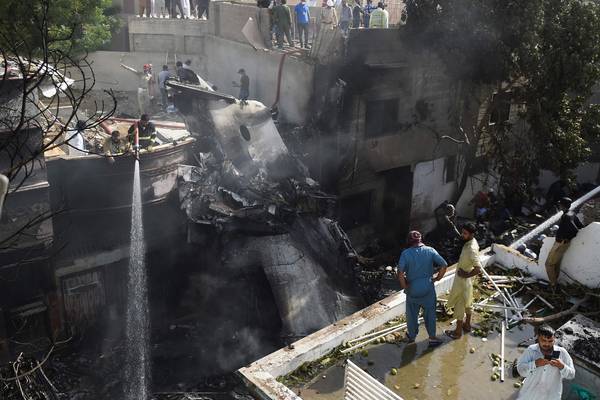 Plane with 99 on board crashes into houses in Pakistan