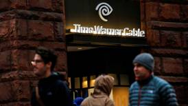 AT&T-Time Warner deal sparks talk of new era of mergers