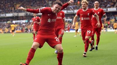 Robertson strikes late as Liverpool come from behind to beat Wolves and continue strong start