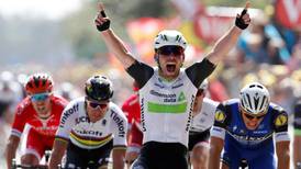 Tour de France: Mark Cavendish claims yellow jersey for first time