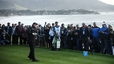 Phil Mickelson leads by three as play halted at Pebble Beach