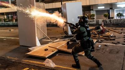 Hong Kong enters recession as street protests erupt in flames