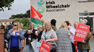 Irish Wheelchair Association members on strike from care centres in pay dispute