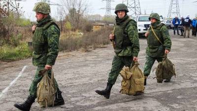 Shelling in eastern Ukraine casts doubt on key troop withdrawal