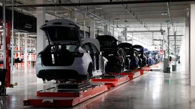 Tesla profits jump despite production turmoil and China shutdowns