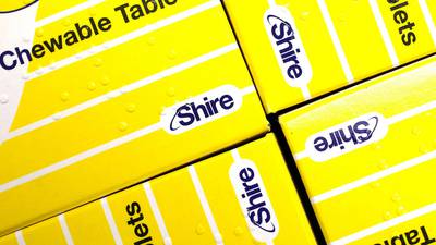 Shire shares surge as drug group upgrades earnings guidance