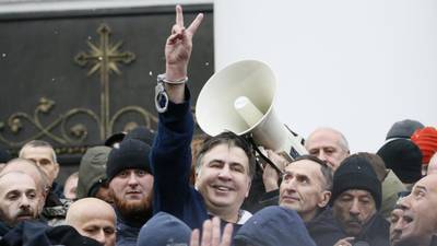 Ukrainian protesters free Saakashvili after rooftop arrest